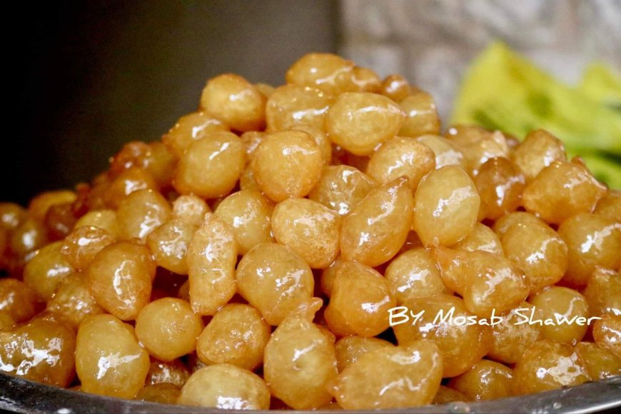 صناعة حلوى العوامة "لقمة القاضي" داخل البلدة القديمة في الخليل