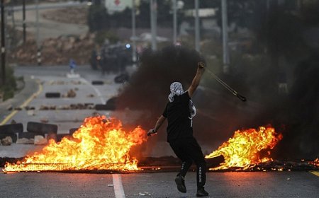 مواجهات واعتقالات بالضفة واشتباكات في جنين ومخيمها